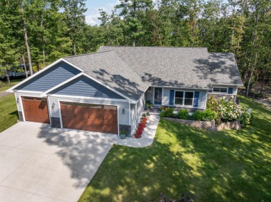 Meticulously maintained and beautifully updated, this stunning on Indian River Golf Club in Michigan - for sale on GolfHomes.com, golf home, golf lot