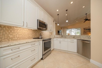 Bright,Cheerful & Immaculate Waterfront Home In Premier 55+ on Slammer and Squire Golf Course in Florida - for sale on GolfHomes.com, golf home, golf lot