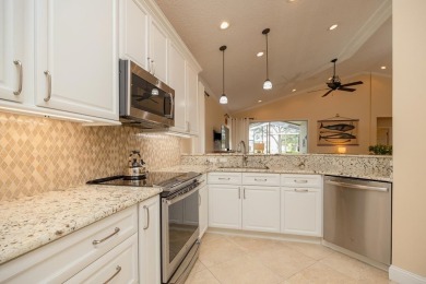 Bright,Cheerful & Immaculate Waterfront Home In Premier 55+ on Slammer and Squire Golf Course in Florida - for sale on GolfHomes.com, golf home, golf lot
