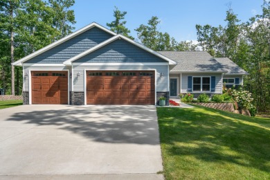 Meticulously maintained and beautifully updated, this stunning on Indian River Golf Club in Michigan - for sale on GolfHomes.com, golf home, golf lot