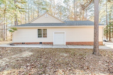 Price Reduction! Welcome to your gorgeous *home sweet home* here on Carolina Trace Country Club in North Carolina - for sale on GolfHomes.com, golf home, golf lot