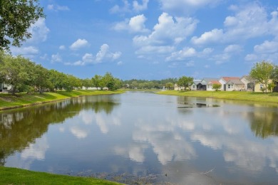 Bright,Cheerful & Immaculate Waterfront Home In Premier 55+ on Slammer and Squire Golf Course in Florida - for sale on GolfHomes.com, golf home, golf lot