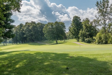 Overlooking hole #8, on the beautiful Heritage Glen golf course on Heritage Glen Golf Club in Michigan - for sale on GolfHomes.com, golf home, golf lot