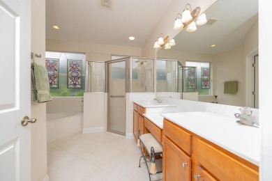 Bright,Cheerful & Immaculate Waterfront Home In Premier 55+ on Slammer and Squire Golf Course in Florida - for sale on GolfHomes.com, golf home, golf lot