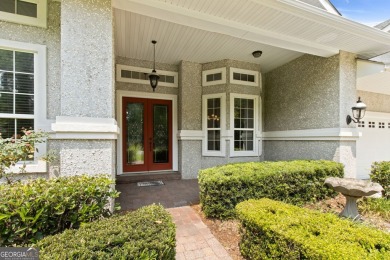Step into a world of elegance and comfort with this timeless on Laurel Island Links in Georgia - for sale on GolfHomes.com, golf home, golf lot