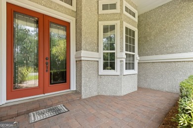 Step into a world of elegance and comfort with this timeless on Laurel Island Links in Georgia - for sale on GolfHomes.com, golf home, golf lot
