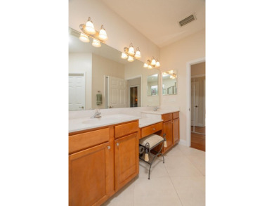 Bright,Cheerful & Immaculate Waterfront Home In Premier 55+ on Slammer and Squire Golf Course in Florida - for sale on GolfHomes.com, golf home, golf lot