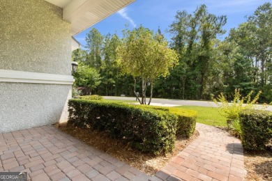 Step into a world of elegance and comfort with this timeless on Laurel Island Links in Georgia - for sale on GolfHomes.com, golf home, golf lot