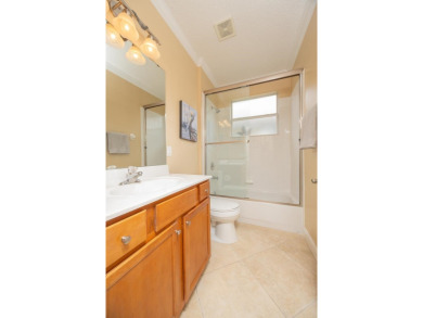 Bright,Cheerful & Immaculate Waterfront Home In Premier 55+ on Slammer and Squire Golf Course in Florida - for sale on GolfHomes.com, golf home, golf lot