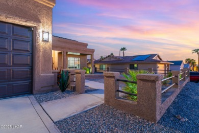 Immaculate four bedroom home located on a beautiful street in a on London Bridge Golf Course in Arizona - for sale on GolfHomes.com, golf home, golf lot