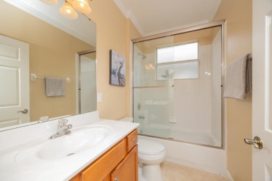 Bright,Cheerful & Immaculate Waterfront Home In Premier 55+ on Slammer and Squire Golf Course in Florida - for sale on GolfHomes.com, golf home, golf lot