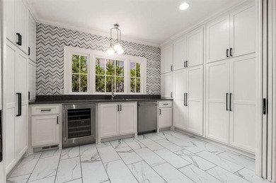 Welcome to this extraordinary, fully remodeled home in Sherwood on Ansley Golf Club At Mid-Town in Georgia - for sale on GolfHomes.com, golf home, golf lot