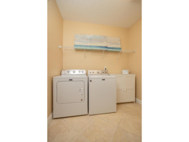 Bright,Cheerful & Immaculate Waterfront Home In Premier 55+ on Slammer and Squire Golf Course in Florida - for sale on GolfHomes.com, golf home, golf lot