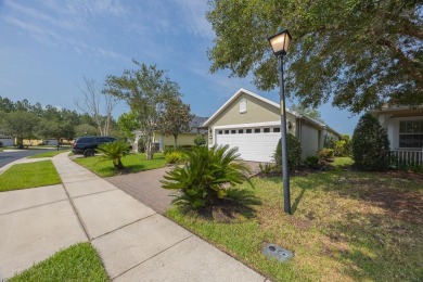 Bright,Cheerful & Immaculate Waterfront Home In Premier 55+ on Slammer and Squire Golf Course in Florida - for sale on GolfHomes.com, golf home, golf lot