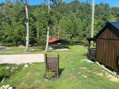 Views of surrounding mountains. Are you looking for the perfect on Rumbling Bald Resort on Lake Lure in North Carolina - for sale on GolfHomes.com, golf home, golf lot