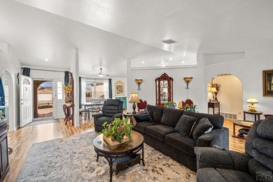 There's a calm that greets you the moment you enter this on Desert Hawk At Pueblo West in Colorado - for sale on GolfHomes.com, golf home, golf lot