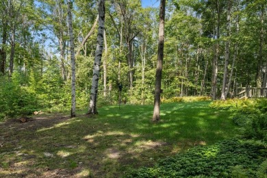Well-built home located just outside the city of Petoskey! on Petoskey-Bay View Country Club in Michigan - for sale on GolfHomes.com, golf home, golf lot