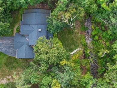 Well-built home located just outside the city of Petoskey! on Petoskey-Bay View Country Club in Michigan - for sale on GolfHomes.com, golf home, golf lot