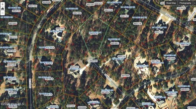 Buildable lot in gated Seven Lakes West with 4-bedroom septic on Beacon Ridge Golf and Country Club in North Carolina - for sale on GolfHomes.com, golf home, golf lot