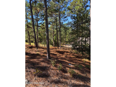 Buildable lot in gated Seven Lakes West with 4-bedroom septic on Beacon Ridge Golf and Country Club in North Carolina - for sale on GolfHomes.com, golf home, golf lot