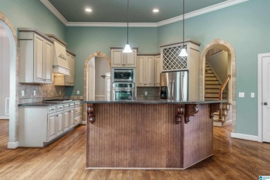 Discover luxury living in this custom-built home in Ballantrae on Ballantrae Golf Club in Alabama - for sale on GolfHomes.com, golf home, golf lot