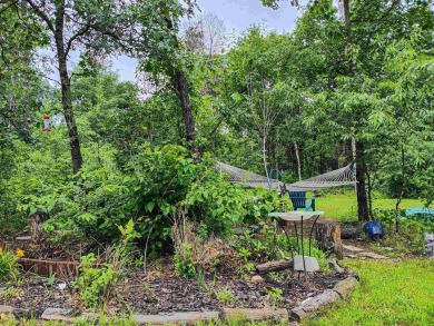 Turnkey getaway in the Town of Rome! This .52-acre lot offers on Sand Valley Golf Course in Wisconsin - for sale on GolfHomes.com, golf home, golf lot