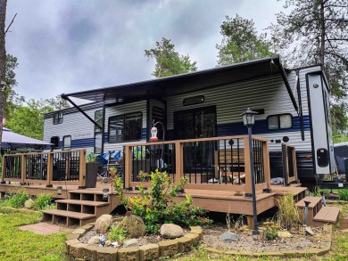 Turnkey getaway in the Town of Rome! This .52-acre lot offers on Sand Valley Golf Course in Wisconsin - for sale on GolfHomes.com, golf home, golf lot