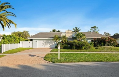 Nestled on a quiet street, this stunning home offers a blend of on The Country Club At Boca Raton in Florida - for sale on GolfHomes.com, golf home, golf lot