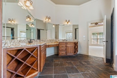 Discover luxury living in this custom-built home in Ballantrae on Ballantrae Golf Club in Alabama - for sale on GolfHomes.com, golf home, golf lot