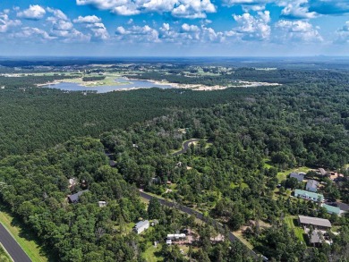 Turnkey getaway in the Town of Rome! This .52-acre lot offers on Sand Valley Golf Course in Wisconsin - for sale on GolfHomes.com, golf home, golf lot