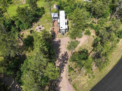 Turnkey getaway in the Town of Rome! This .52-acre lot offers on Sand Valley Golf Course in Wisconsin - for sale on GolfHomes.com, golf home, golf lot