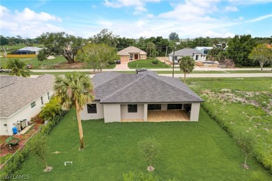 Live the country club lifestyle without the fees. Hop in the on Coral Oaks Golf Course in Florida - for sale on GolfHomes.com, golf home, golf lot