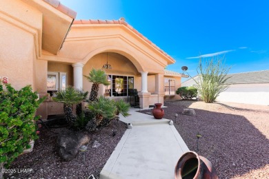 This home checks all the boxes! Total of 5 bedrooms, 4 baths, 3 on London Bridge Golf Course in Arizona - for sale on GolfHomes.com, golf home, golf lot