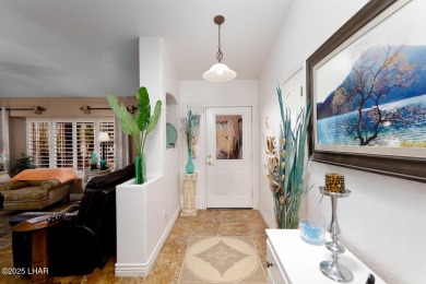 This home checks all the boxes! Total of 5 bedrooms, 4 baths, 3 on London Bridge Golf Course in Arizona - for sale on GolfHomes.com, golf home, golf lot