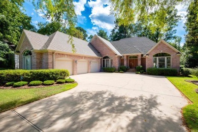 Welcome to this traditional two-story home located on the 7th on Chenal Country Club - Bear Den Mountain in Arkansas - for sale on GolfHomes.com, golf home, golf lot