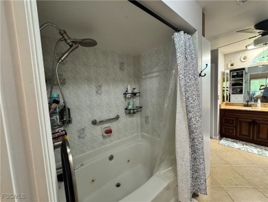 Virtually a full remodel since ownership on this very inviting on Riverbend Golf and Country Club in Florida - for sale on GolfHomes.com, golf home, golf lot