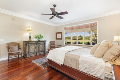 Located on the 14th hole in prestigious Jupiter Hills Village on Jupiter Hills Club in Florida - for sale on GolfHomes.com, golf home, golf lot