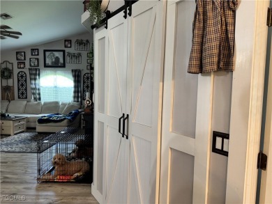 Virtually a full remodel since ownership on this very inviting on Riverbend Golf and Country Club in Florida - for sale on GolfHomes.com, golf home, golf lot