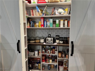 Virtually a full remodel since ownership on this very inviting on Riverbend Golf and Country Club in Florida - for sale on GolfHomes.com, golf home, golf lot