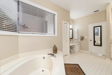 Located on the 14th hole in prestigious Jupiter Hills Village on Jupiter Hills Club in Florida - for sale on GolfHomes.com, golf home, golf lot