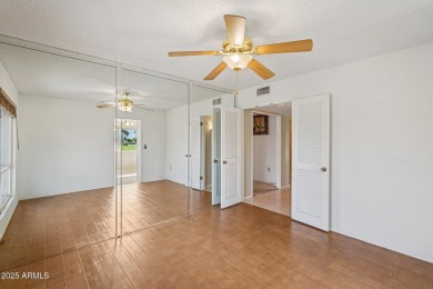 This spacious Columbine model sits on a large lot with on Sun City Lakes West and East in Arizona - for sale on GolfHomes.com, golf home, golf lot