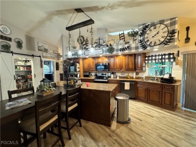 Virtually a full remodel since ownership on this very inviting on Riverbend Golf and Country Club in Florida - for sale on GolfHomes.com, golf home, golf lot