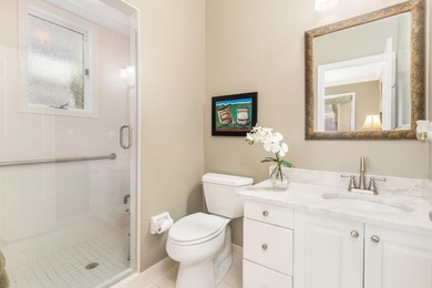 Located on the 14th hole in prestigious Jupiter Hills Village on Jupiter Hills Club in Florida - for sale on GolfHomes.com, golf home, golf lot