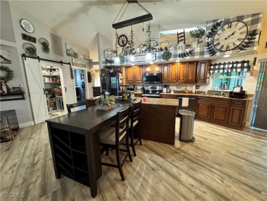 Virtually a full remodel since ownership on this very inviting on Riverbend Golf and Country Club in Florida - for sale on GolfHomes.com, golf home, golf lot