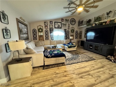 Virtually a full remodel since ownership on this very inviting on Riverbend Golf and Country Club in Florida - for sale on GolfHomes.com, golf home, golf lot