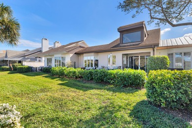 Located on the 14th hole in prestigious Jupiter Hills Village on Jupiter Hills Club in Florida - for sale on GolfHomes.com, golf home, golf lot
