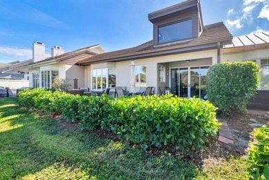 Located on the 14th hole in prestigious Jupiter Hills Village on Jupiter Hills Club in Florida - for sale on GolfHomes.com, golf home, golf lot