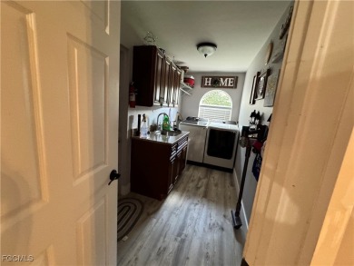 Virtually a full remodel since ownership on this very inviting on Riverbend Golf and Country Club in Florida - for sale on GolfHomes.com, golf home, golf lot