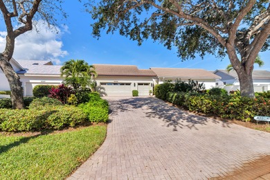 Located on the 14th hole in prestigious Jupiter Hills Village on Jupiter Hills Club in Florida - for sale on GolfHomes.com, golf home, golf lot