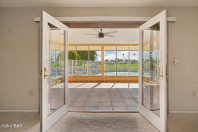 This spacious Columbine model sits on a large lot with on Sun City Lakes West and East in Arizona - for sale on GolfHomes.com, golf home, golf lot